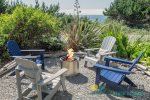 There is a fire pit in front of the home. Perfect to cuddle up around and watch the famous Manzanita sunsets.